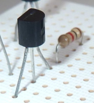 Resistor before transistor