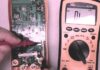 How do you test a capacitor with a multimeter?